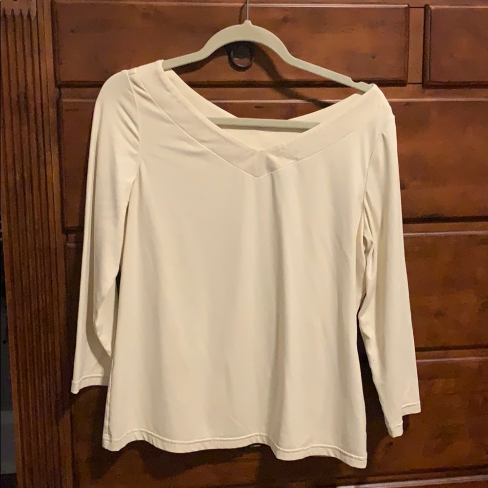 Doncaster 3/4 sleeve cream colored shirt.